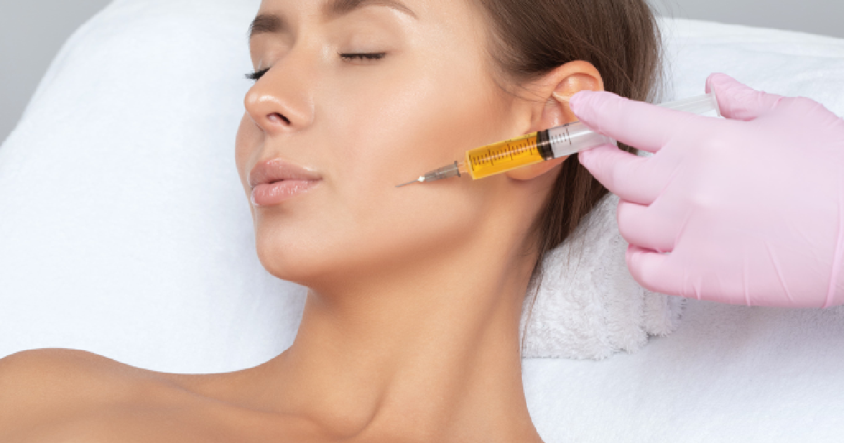 Woman receiving a PRP facial injection near the cheek, performed by a professional in Great Neck, NY